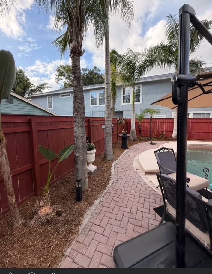 Palm trees along a garden path